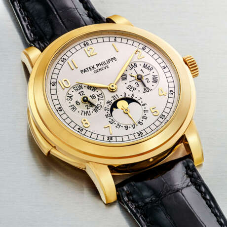 PATEK PHILIPPE. A RARE 18K GOLD AUTOMATIC “CATHEDRAL” MINUTE REPEATING PERPETUAL CALENDAR WRISTWATCH WITH MOON PHASES, 24 HOUR AND LEAP YEAR INDICATION - photo 2