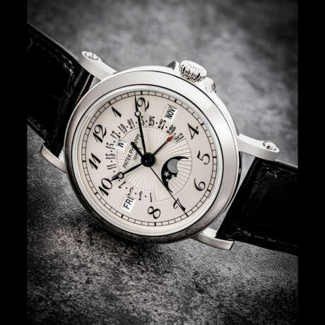 PATEK PHILIPPE. A VERY RARE LIMITED EDITION 18K WHITE GOLD AUTOMATIC PERPETUAL CALENDAR WRISTWATCH WITH SWEEP CENTRE SECONDS, LEAP YEAR INDICATION, RETROGRADE DATE, MOON PHASES AND BREGUET NUMERALS, MADE FOR THE LONDON BOUTIQUE IN 2015 - фото 1
