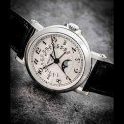 PATEK PHILIPPE. A VERY RARE LIMITED EDITION 18K WHITE GOLD AUTOMATIC PERPETUAL CALENDAR WRISTWATCH WITH SWEEP CENTRE SECONDS, LEAP YEAR INDICATION, RETROGRADE DATE, MOON PHASES AND BREGUET NUMERALS, MADE FOR THE LONDON BOUTIQUE IN 2015