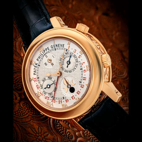 PATEK PHILIPPE. A MAGNIFICENT, EXTREMELY RARE AND HIGHLY COMPLICATED 18K PINK GOLD DOUBLE-DIAL WRISTWATCH WITH TWELVE COMPLICATIONS INCLUDING "CATHEDRAL" MINUTE REPEATING, TOURBILLON, PERPETUAL CALENDAR WITH RETROGRADE DATE, MOON AGE AND ANGULAR - photo 1