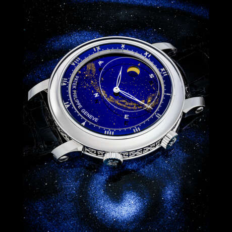 PATEK PHILIPPE. A RARE 18K WHITE GOLD AUTOMATIC ASTRONOMICAL WRISTWATCH WITH SKY CHART, PHASES AND ORBIT OF THE MOON INCLUDING TIME OF MERIDIAN PASSAGE OF SIRIUS AND OF THE MOON - Foto 1