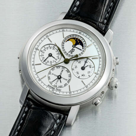 AUDEMARS PIGUET. AN IMPRESSIVE, HIGHLY COMPLICATED AND VERY RARE PLATINUM AUTOMATIC MINUTE REPEATING PERPETUAL CALENDAR SPLIT SECONDS CHRONOGRAPH WRISTWATCH WITH LEAP YEAR INDICATION, NUMBER OF WEEK AND MOON PHASES - photo 2