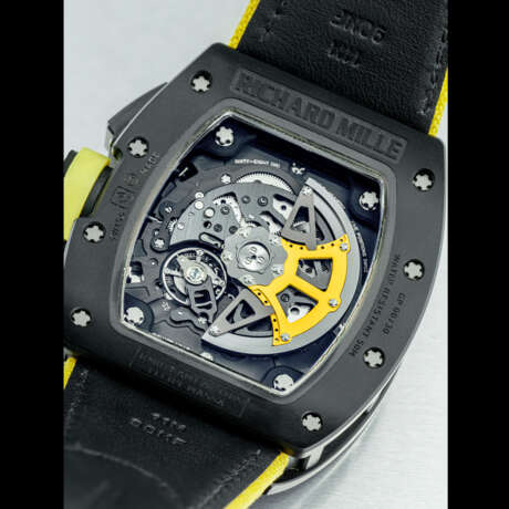 RICHARD MILLE. AN EXTREMELY RARE CARBON NANOTUBE LIMITED EDITION TONNEAU-SHAPED AUTOMATIC SEMI-SKELETONISED FLYBACK CHRONOGRAPH WRISTWATCH WITH ANNUAL CALENDAR - фото 2