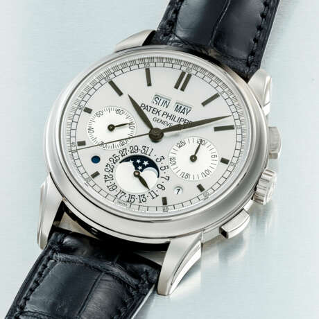 PATEK PHILIPPE. AN 18K WHITE GOLD PERPETUAL CALENDAR CHRONOGRAPH WRISTWATCH WITH MOON PHASES, LEAP YEAR AND DAY/NIGHT INDICATION - photo 2