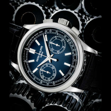 PATEK PHILIPPE. A PLATINUM AND DIAMOND-SET CHRONOGRAPH WRISTWATCH WITH TACHYMETER SCALE - photo 1