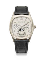 PATEK PHILIPPE. A RARE 18K WHITE GOLD PERPETUAL CALENDAR CUSHION-SHAPED AUTOMATIC WRISTWATCH WITH MOON PHASES, 24-HOUR, LEAP YEAR INDICATION, ADDITIONAL CASE BACK, CERTIFICATE OF ORIGIN AND BOX