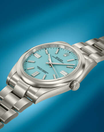 ROLEX. AN ATTRACTIVE STAINLESS STEEL AUTOMATIC WRISTWATCH WITH SWEEP CENTRE SECONDS, BRACELET, `TURQUOISE BLUE` DIAL, GUARANTEE AND BOX - фото 3