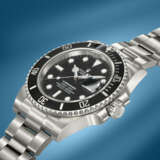 ROLEX. A STAINLESS STEEL AUTOMATIC WRISTWATCH WITH SWEEP CENTRE SECONDS, DATE, BRACELET, GUARANTEE AND BOX - Foto 3