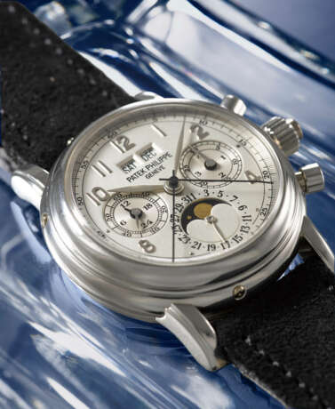 PATEK PHILIPPE. A VERY RARE PLATINUM PERPETUAL CALENDAR SPLIT SECONDS CHRONOGRAPH WRISTWATCH WITH MOON PHASES, 24 HOUR AND LEAP YEAR INDICATION - photo 3