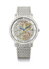 PATEK PHILIPPE. AN ATTRACTIVE 18K WHITE GOLD SKELETONIZED AUTOMATIC WRISTWATCH WITH BRACELET, CERTIFICATE OF ORIGIN AND BOX