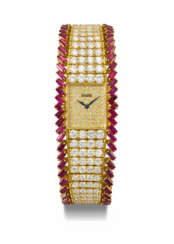 PIAGET. A LADY’S EXTREMELY ATTRACTIVE 18K GOLD, DIAMOND AND RUBY-SET WRISTWATCH WITH INTEGRAL PIAGET BRACELET