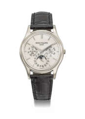 PATEK PHILIPPE. A 18K WHITE GOLD AUTOMATIC PERPETUAL CALENDAR WRISTWATCH WITH MOON PHASES, 24 HOUR, LEAP YEAR INDICATION, ADDITIONAL CASE BACK, CERTIFICATE OF ORIGIN AND BOX
