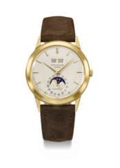 PATEK PHILIPPE. A VERY FINE AND RARE 18K GOLD AUTOMATIC PERPETUAL CALENDAR WRISTWATCH WITH PHASES OF THE MOON
