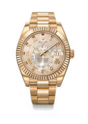 ROLEX. AN ATTRACTIVE 18K PINK GOLD AUTOMATIC ANNUAL CALENDAR WRISTWATCH WITH DUAL TIME, SWEEP CENTRE SECONDS AND BRACELET