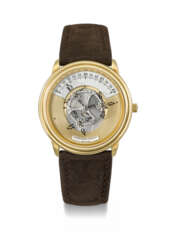 AUDEMARS PIGUET. AN ATTRACTIVE AND UNUSUAL 18K GOLD AUTOMATIC WANDERING HOUR WRISTWATCH