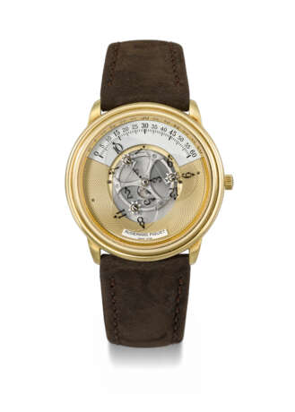 AUDEMARS PIGUET. AN ATTRACTIVE AND UNUSUAL 18K GOLD AUTOMATIC WANDERING HOUR WRISTWATCH - Foto 1