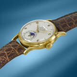 PATEK PHILIPPE. A RARE AND ATTRACTIVE 18K GOLD PERPETUAL CALENDAR WRISTWATCH WITH MOON PHASES - photo 2