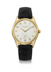 PATEK PHILIPPE. A VERY RARE AND ATTRACTIVE 18K GOLD AUTOMATIC WRISTWATCH WITH IVORY-COLOURED ENAMEL DIAL, BREGUET NUMERALS AND BOX