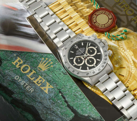 ROLEX. A STAINLESS STEEL AUTOMATIC CHRONOGRAPH WRISTWATCH WITH BRACELET AND BOX - photo 2