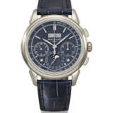 PATEK PHILIPPE. AN EXTREMELY ATTRACTIVE 18K WHITE GOLD PERPETUAL CALENDAR CHRONOGRAPH WRISTWATCH WITH MOON PHASES, LEAP YEAR, DAY/NIGHT INDICATOR, ADDITIONAL CASE BACK, CERTIFICATE OF ORIGIN AND BOX - photo 1