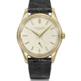 PATEK PHILIPPE. A VERY RARE 18K GOLD AUTOMATIC WRISTWATCH WITH CREAM-COLOURED ENAMEL DIAL - Foto 1