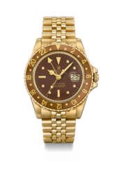 ROLEX. AN ATTRACTIVE 18K GOLD AUTOMATIC DUAL TIME WRISTWATCH WITH SWEEP CENTRE SECONDS, DATE, BRACELET AND BOX