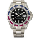 ROLEX. A RARE AND ATTRACTIVE 18K WHITE GOLD, DIAMOND, RUBY AND SAPPHIRE-SET AUTOMATIC DUAL TIME WRISTWATCH WITH SWEEP CENTRE SECONDS, DATE, BRACELET, GUARANTEE AND BOX - фото 1