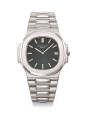 PATEK PHILIPPE. A VERY RARE STAINLESS STEEL AUTOMATIC WRISTWATCH WITH DATE, BRACELET, CORK BOX AND CERTIFICATE OF GUARANTEE