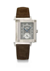 JAEGER-LECOULTRE. A VERY RARE PLATINUM LIMITED EDITION TOURBILLON REVERSO WRISTWATCH WITH POWER RESERVE INDICATION AND BOX