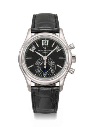 PATEK PHILIPPE. AN ATTRACTIVE PLATINUM AUTOMATIC ANNUAL CALENDAR FLYBACK CHRONOGRAPH WRISTWATCH WITH POWER RESERVE, DAY/NIGHT INDICATOR, CERTIFICATE OF ORIGIN AND BOX - photo 1
