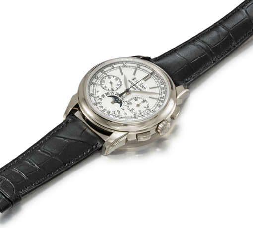 PATEK PHILIPPE. A RARE 18K WHITE GOLD PERPETUAL CALENDAR CHRONOGRAPH WRISTWATCH WITH MOON PHASES, LEAP YEAR, DAY/NIGHT INDICATOR, ADDITIONAL CASE BACK, CERTIFICATE OF ORIGIN AND BOX - Foto 3