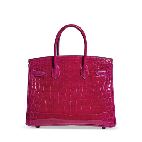 A SHINY ROSE POURPRE NILOTICUS CROCODILE BIRKIN 30 WITH PALLADIUM HARDWARE
BIRKIN 30 EN CROCODILE NILOTICUS LISSE ROSE POURPRE, GARNITURE EN M&#201;TAL ARGENT&#201; PALLADI&#201; - Foto 3