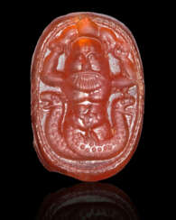 A GREEK CARNELIAN SCARAB WITH A MONSTER