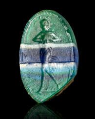A ROMAN STRIPED GLASS RINGSTONE WITH A MAENAD