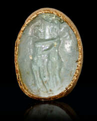 A ROMAN PALE GREEN GLASS CAMEO WITH EROS AND PSYCHE