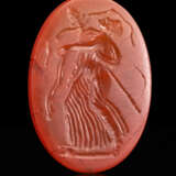 A ROMAN CARNELIAN RINGSTONE WITH A DANCING MAENAD - photo 1