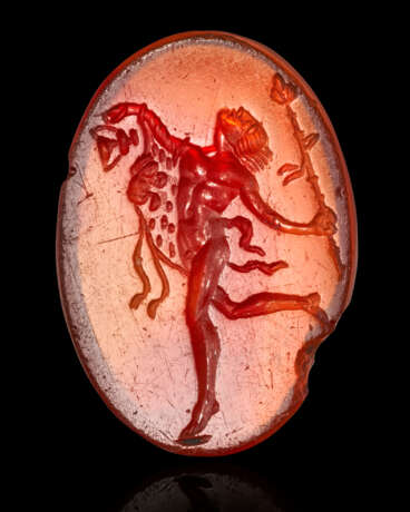 A ROMAN CARNELIAN RINGSTONE WITH A DANCING SATYR - Foto 1