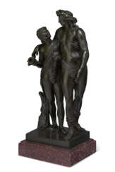 A BRONZE GROUP OF BACCHUS AND SATYR