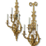 A PAIR OF FRENCH ORMOLU THREE-LIGHT WALL APPLIQUES - photo 2