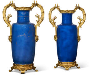 A PAIR OF LOUIS XV ORMOLU-MOUNTED CHINESE POWDER-BLUE PORCELAIN VASES