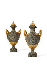 A PAIR OF NORTH EUROPEAN ORMOLU-MOUNTED GRAY GRANITE TWO-HANDLED VASES