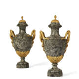 A PAIR OF NORTH EUROPEAN ORMOLU-MOUNTED GRAY GRANITE TWO-HANDLED VASES - photo 1