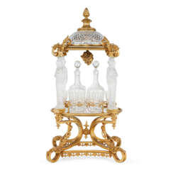 A FRENCH ORMOLU-MOUNTED CUT AND MOLDED GLASS TANTALUS