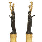 A PAIR OF CONSULAT ORMOLU AND PATINATED BRONZE THREE-LIGHT CANDELABRA - фото 4