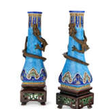 A PAIR OF MINTONS PORCELAIN TURQUOISE-GROUND 'DRAGON' VASES ON STANDS - photo 1