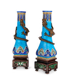 A PAIR OF MINTONS PORCELAIN TURQUOISE-GROUND 'DRAGON' VASES ON STANDS