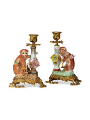 A PAIR OF ORMOLU-MOUNTED CHINESE EXPORT MONKEY AND VASE CANDLESTICKS