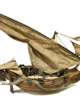 A model of the Portuguese fishing boat muleta. Модель португальской рыбацкой лодки мулеты. A model of the Portuguese fishing boat muleta. Модель португальской рыбацкой лодки мулеты.
