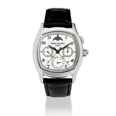 PATEK PHILIPPE. A RARE PLATINUM CUSHION-SHAPED PERPETUAL CALENDAR SINGLE BUTTON SPLIT SECONDS CHRONOGRAPH WRISTWATCH WITH MOON PHASES, DAY/NIGHT, LEAP YEAR INDICATION AND LACQUERED WHITE DIAL WITH BLACK BREGUET NUMERALS - photo 1