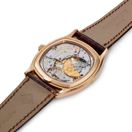 PATEK PHILIPPE. AN 18K PINK GOLD AUTOMATIC PERPETUAL CALENDAR CUSHION-SHAPED WRISTWATCH WITH MOON PHASES, 24 HOUR, LEAP YEAR INDICATION AND BREGUET NUMERALS - фото 3